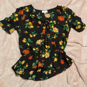 “Socialite” black lemon print peplum blouse